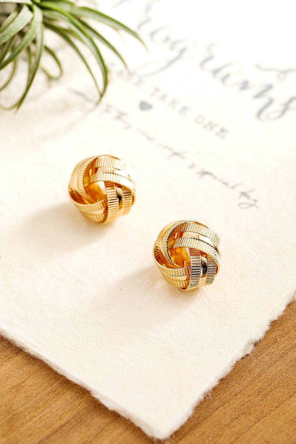 Gold Textured Knot Stud Earrings.