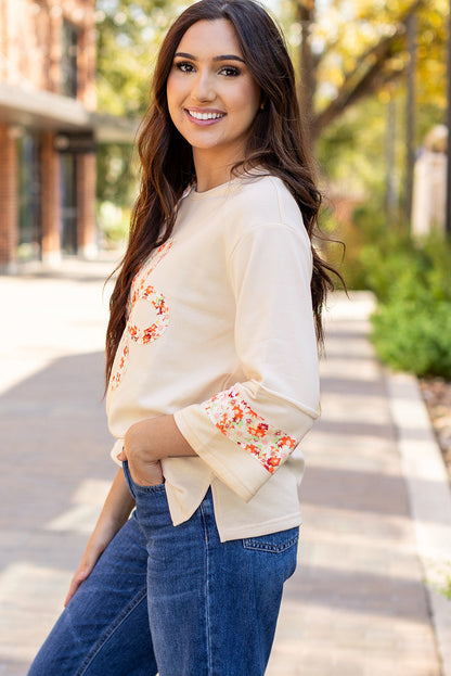 Flower Exposed Seam Wide Sleeve Top