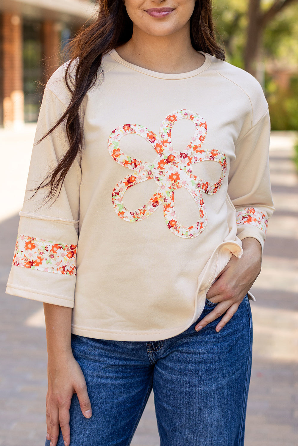 Flower Exposed Seam Wide Sleeve Top